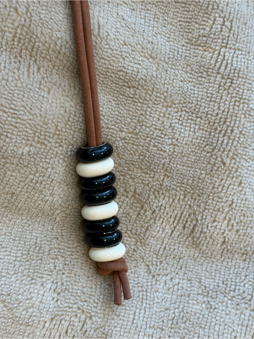 Adina Reyter Black and Cream Beaded Leather Cord keychain charm